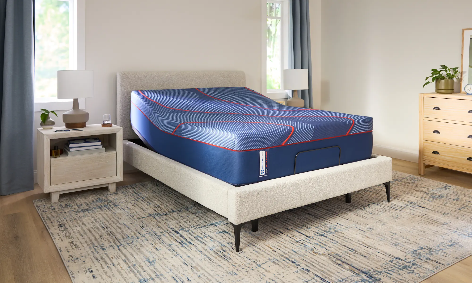Queen size posturepedic mattress on adjustable base